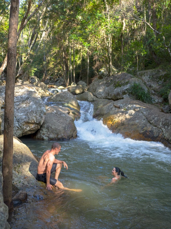 a couple swimming at Cedar Creek, Samford
