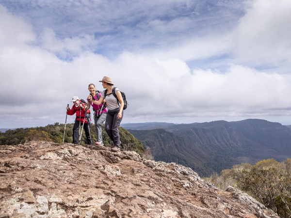 female hikers traversing the Spicers Scenic Rim trail