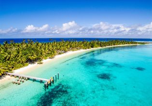 Crystal clear waters of the Cocos (Keeling) Islands with jetty