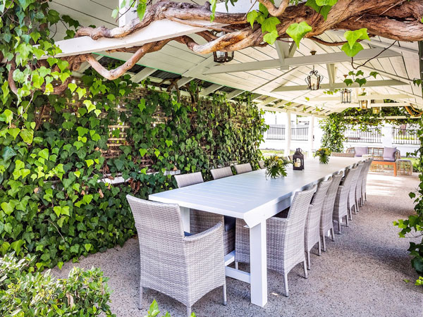 the Amelia Park Tavern lodge surrounded by lush greenery