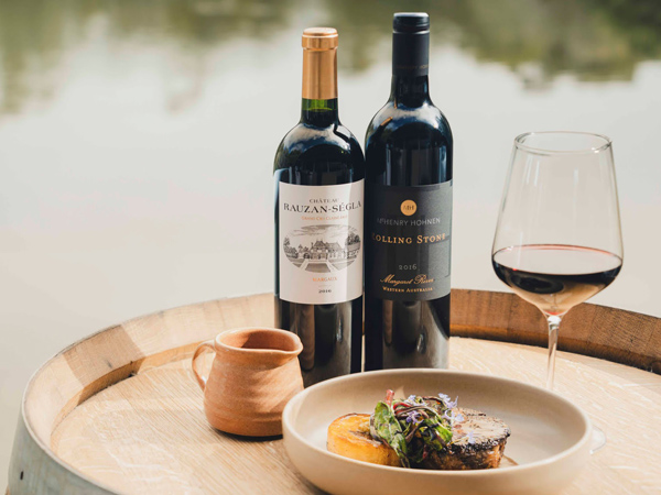 a food plate alongside wines at Cape Lodge, Margaret River