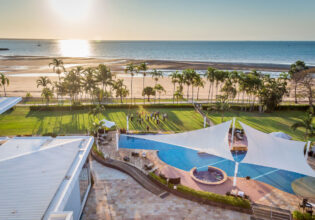 an aerial view of the beach and pool at Mindil Beach Casino Resort Darwin