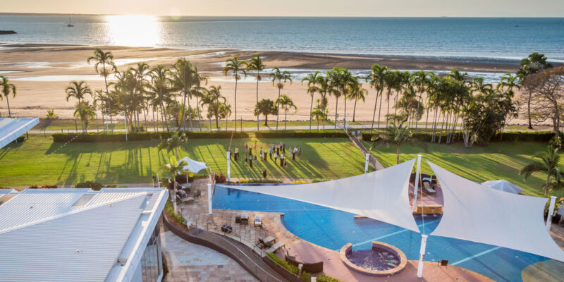 an aerial view of the beach and pool at Mindil Beach Casino Resort Darwin