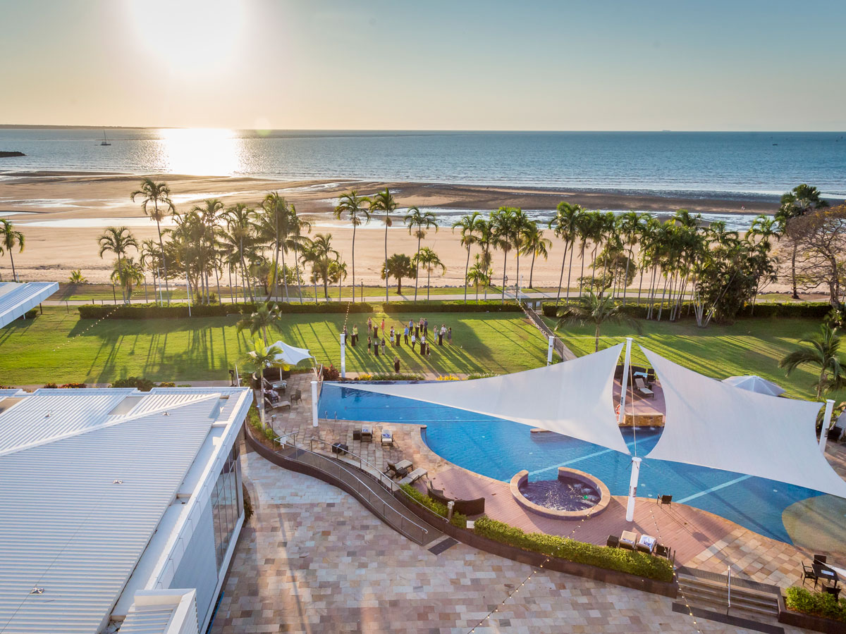 an aerial view of the beach and pool at Mindil Beach Casino Resort Darwin