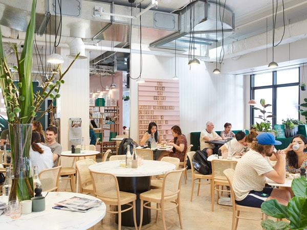 people dining inside Hardware Société cafe in Melbourne CBD