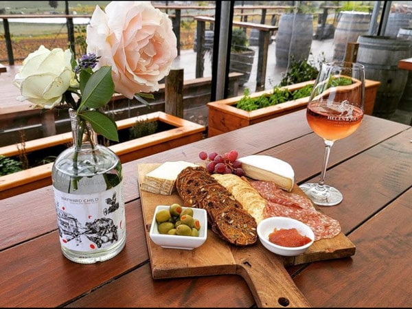glass of Rosé and cheese platter, Helen & Joey Estate