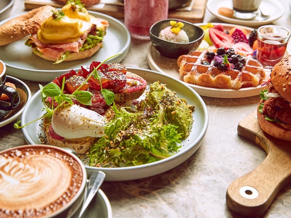 A table full of brunch dishes at Light Years in Melbourne