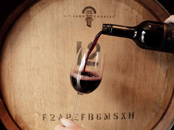 pouring wine into a glass at Artemis Wines