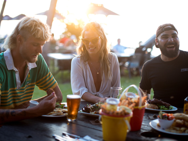 a group of friends dining at The Darwin Ski Club