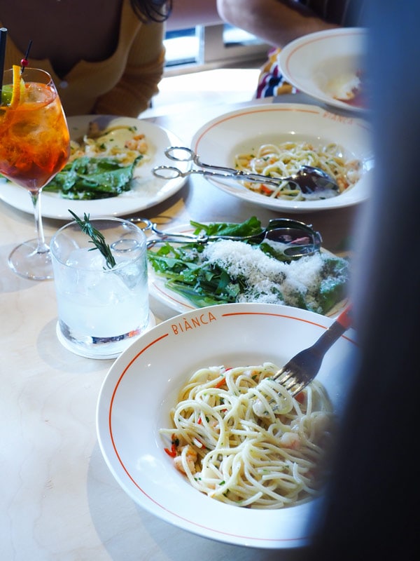 plates of pasta on the table at Biànca restaurant, Brisbane