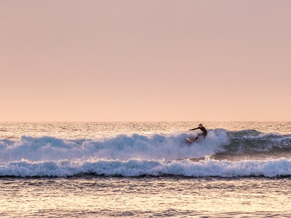 Surfing the waves at Cactus Beach in South Australia