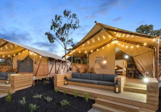 glamping tents with fairy lights in BIG4 Tasman Holiday Parks