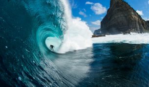 Surfer riding a wave at Shipstern Bluff