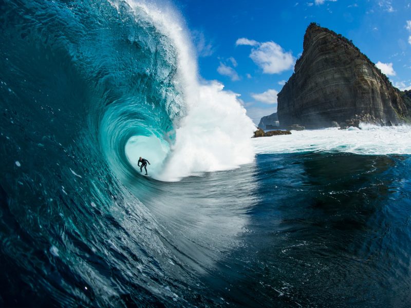 Surfer riding a wave at Shipstern Bluff