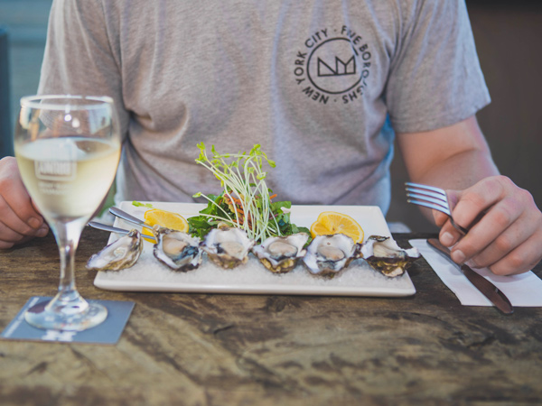 oysters with a glass of wine at Hotel Bruny