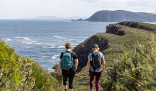 two hikers on a guided walking tour, Bruny Island