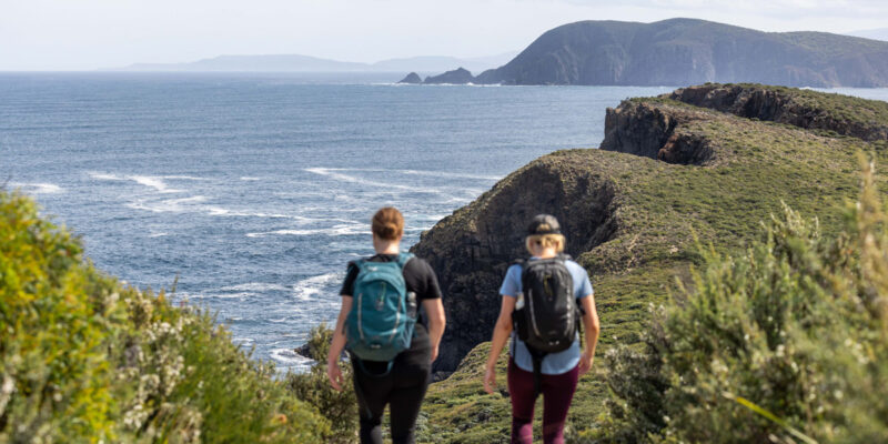 two hikers on a guided walking tour, Bruny Island