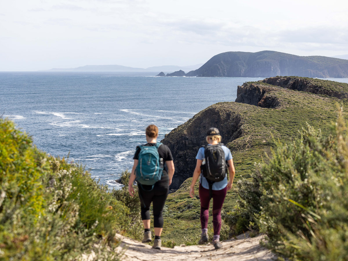 two hikers on a guided walking tour, Bruny Island