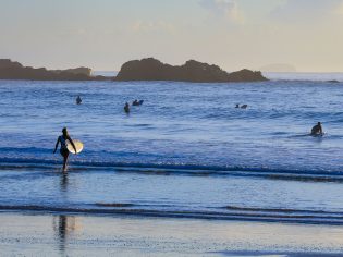 surfing at Diggers Beach, Coffs Harbour.