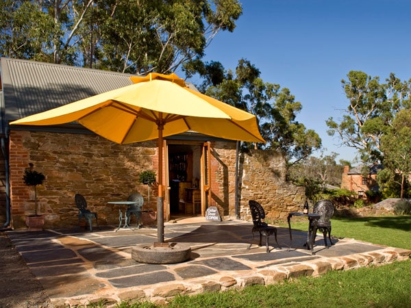 a huge umbrella outside the cellar door of the Battle of Bossworth winery