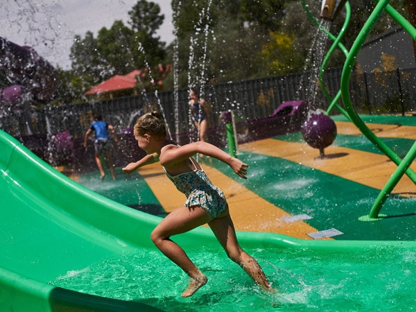 a young girl having fun at the playground in Discovery Parks, Barossa Valley