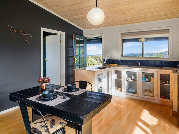 the dining interior with mountain view at Hundred Acre Hideaway