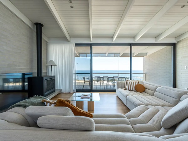Lounge room interior looking out over the ocean at Reef House 1 in McLaren Vale