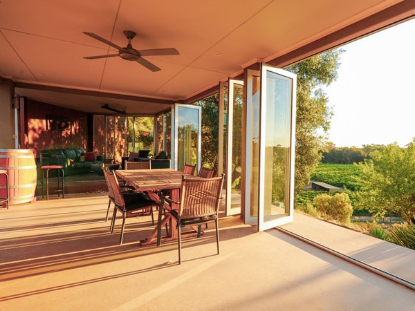 a spacious seating area with open windows