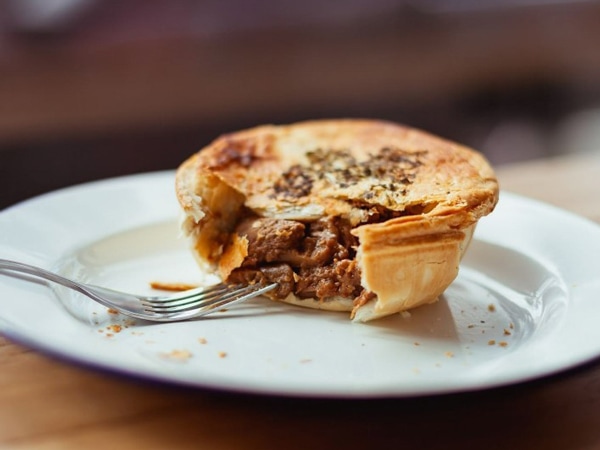 one serving of mushroom beef pie on a plate