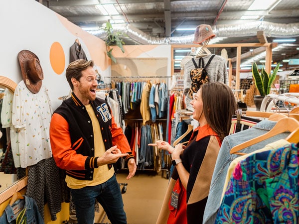 two people talking and laughing inside a vintage bazaar at Castlemaine, Bendigo