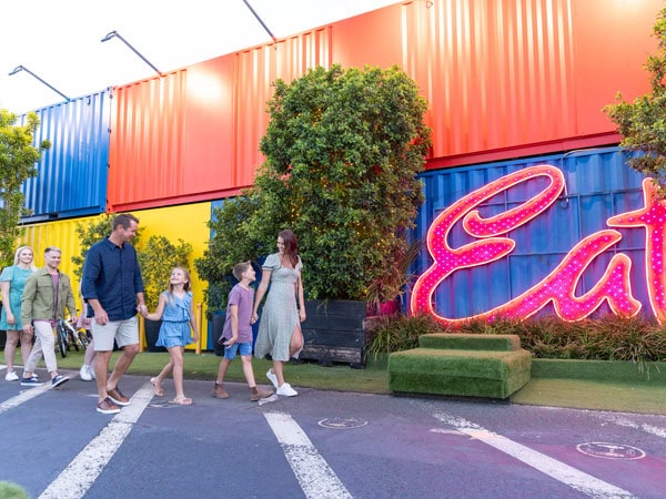 a family marvelling at Eat Street Northshore