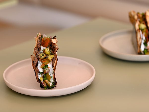 A kafta fold-up balancing on a plate