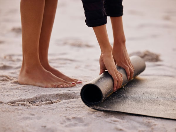 Getty image of beach yoga
