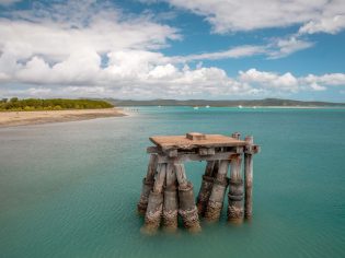 a ruined jetty stand in the middle of the sea off Ngurupai (Horn Island)