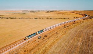 the Indian Pacific train traversing the vast and dry landscape of Clare Valley