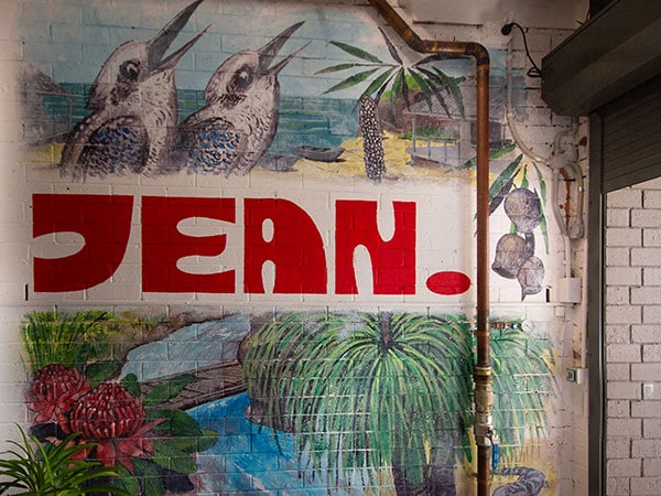 A picture of a wall mural with the words, Jean and kookaburras too