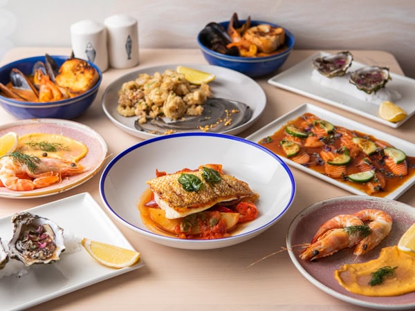 a spread of seafood dishes at One Fish Two Fish, Brisbane