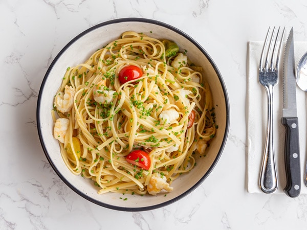 a bowl of Linguine con Gamberi pasta dish