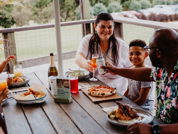 a family enjoying a meal at Victoria Park Bistro