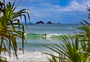 surfing at Wategos Beach, Byron Bay