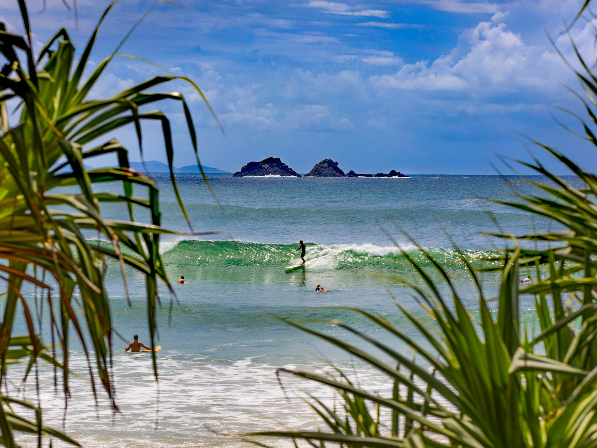 surfing at Wategos Beach, Byron Bay