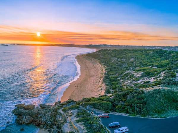 an aerial photo of Point Ritchie Lookout at sunset