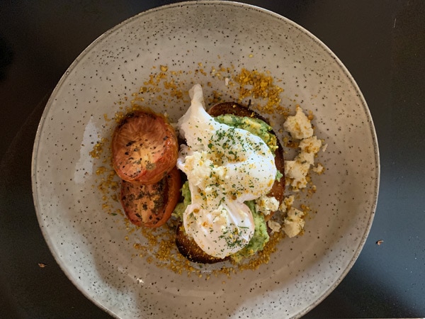 a plate of avocado toast at Riverdeck Kitchen