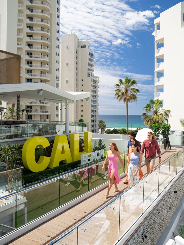 friends strolling around Cali Beach Club, Gold Coast