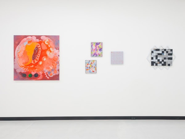 artworks mounted on a white wall at Civic Art Bureau, Canberra