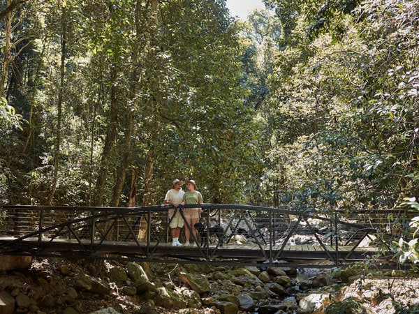 a couple stopping by the Natural Bridge Circuit, Gold Coast