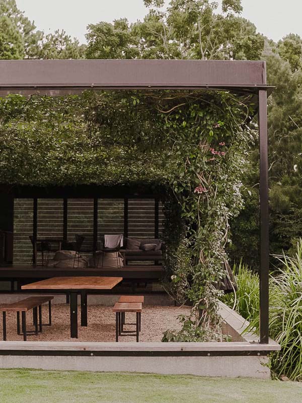 an outdoor dining area at Grand Designs Home, Gold Coast