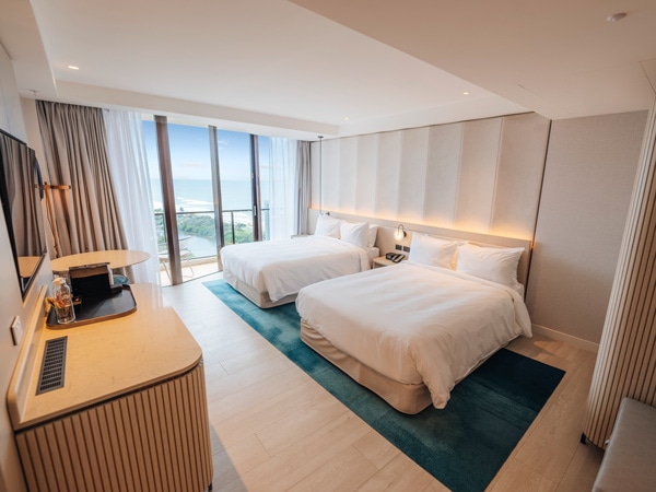 a bedroom with two beds at JW Marriott Gold Coast
