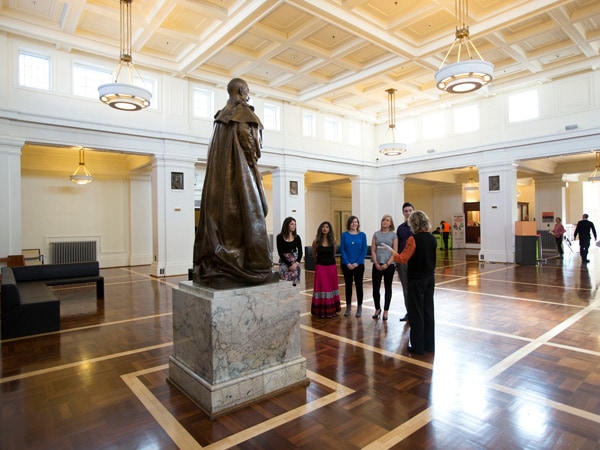 a group of visitors during the museum tour at Museum of Australian Democracy Tour