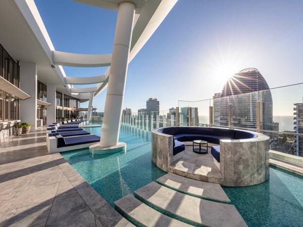 a rooftop pool with sun loungers at Nineteen At The Star